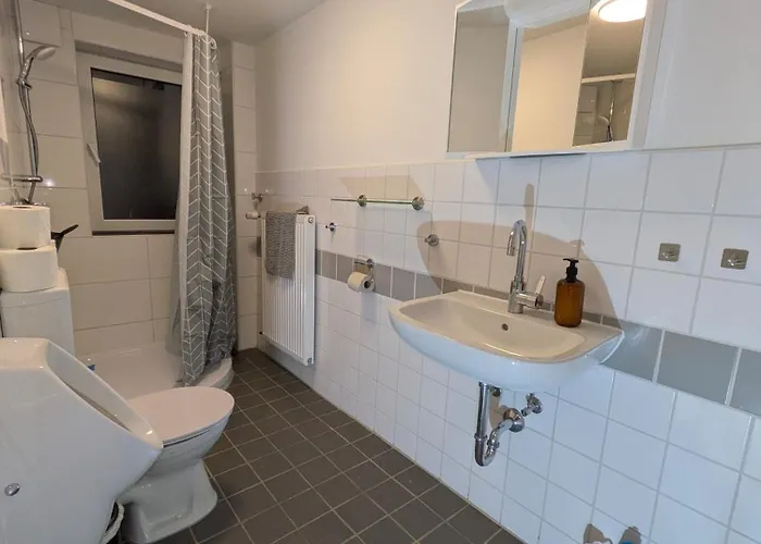 Апартаменты Monteurswohnung Kiwi Parkplatz Kueche 1- 4 Personen Eg Modern